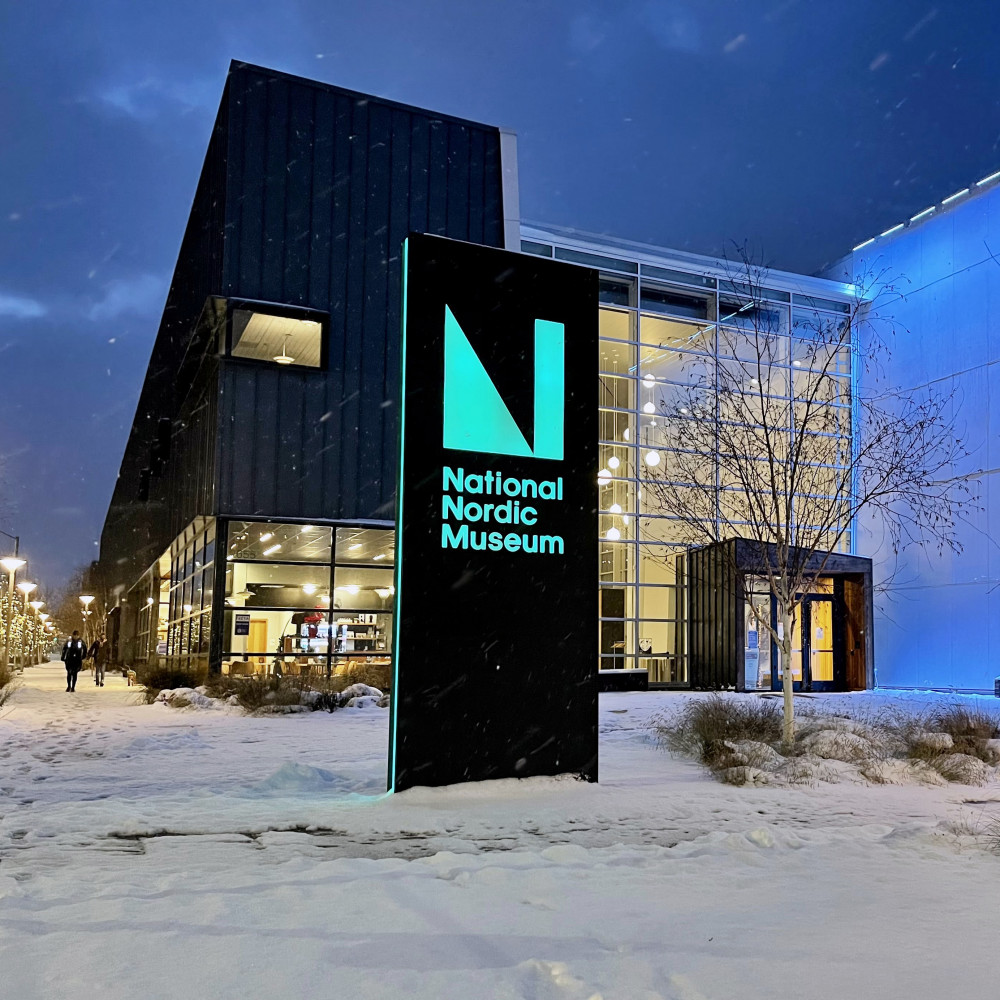 snowy museum at night