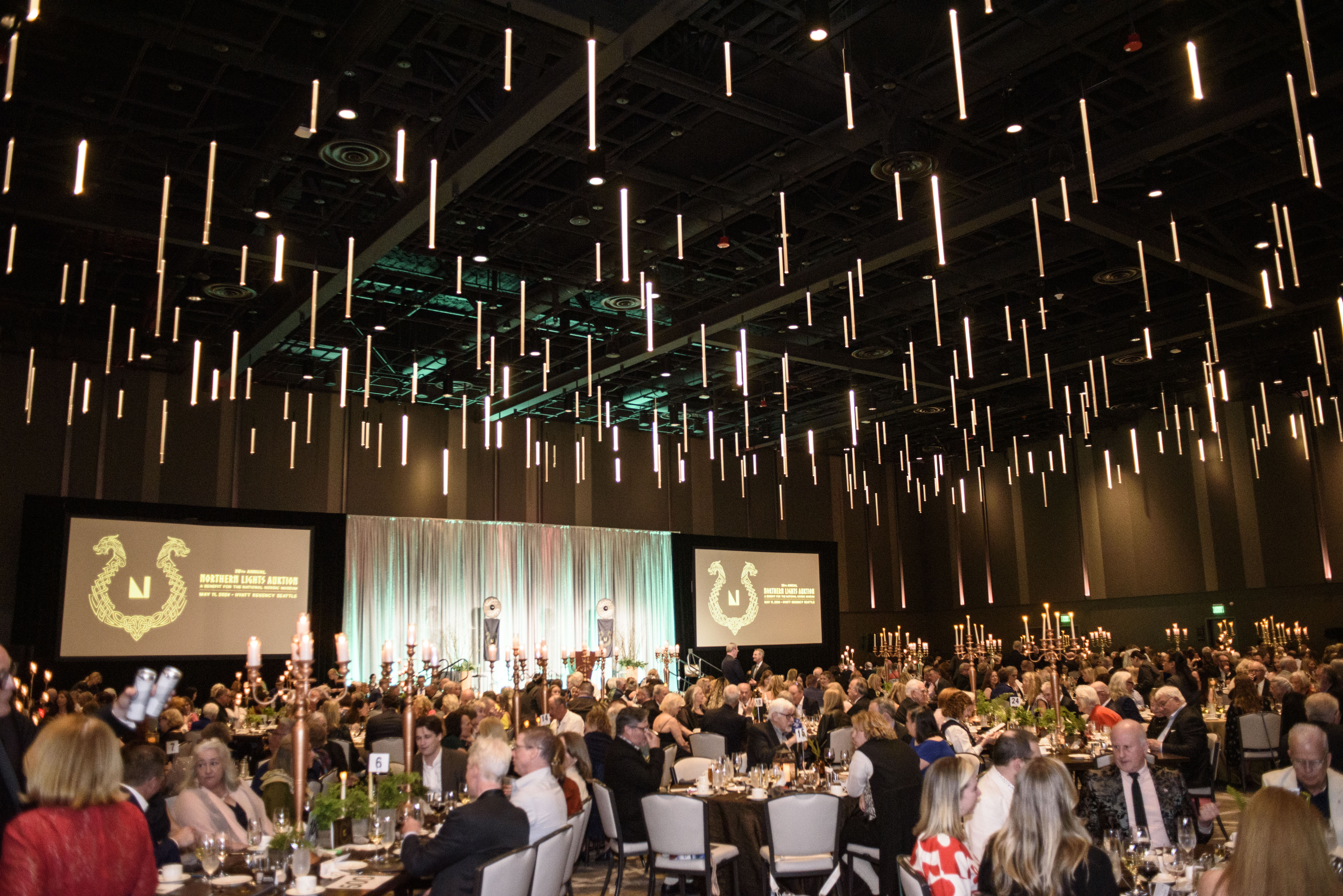 A wide-shot of the dining room in the Hyatt Regency Seattle at the 2024 Auction.