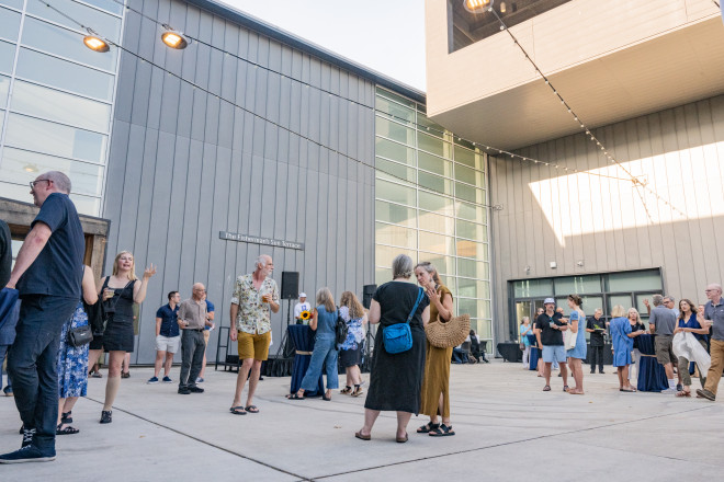 Guests enjoy a party on the Fishermen's Sun Terrace in the summertime.